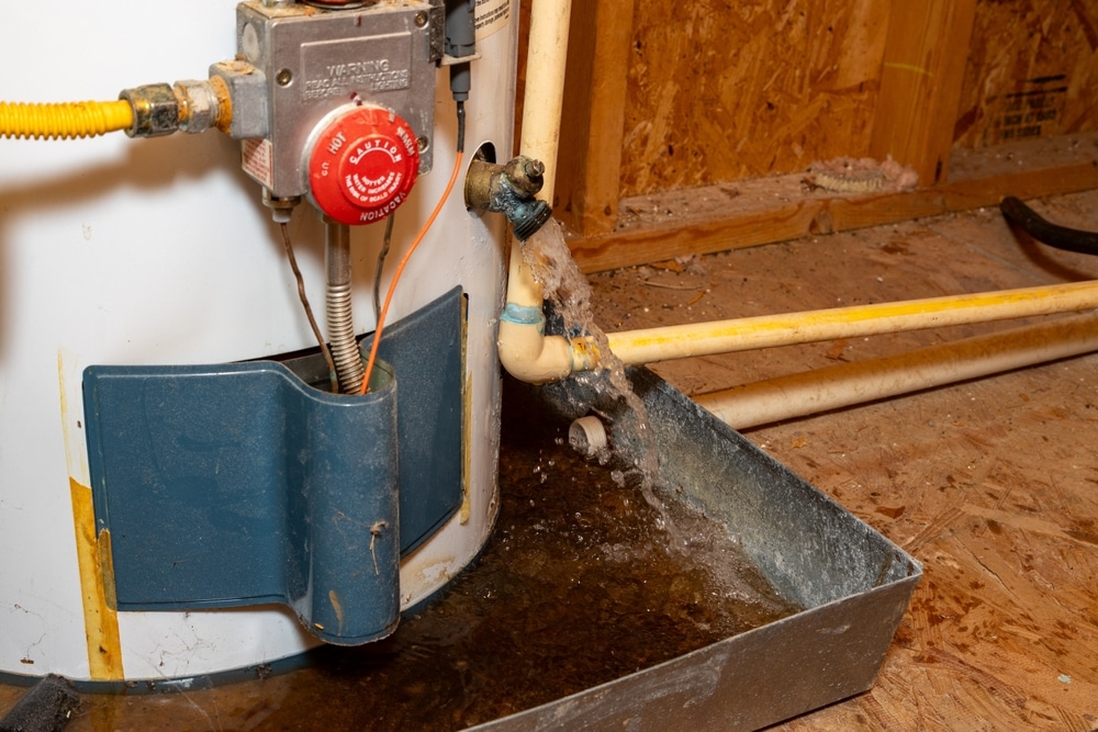 Water,Gushing,Out,Of,Water,Heater,Drain